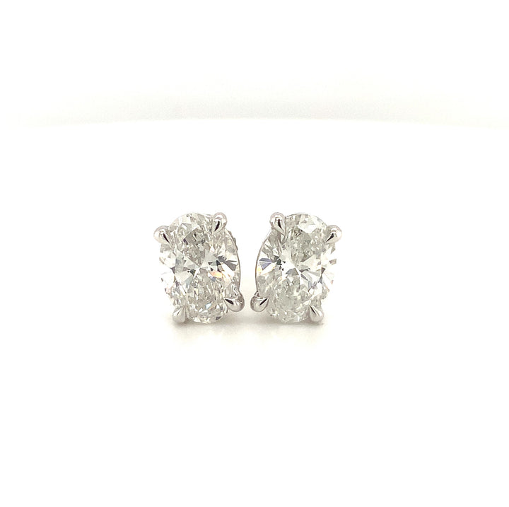 14K White Gold Stud Diamond Earrings 1.59CTW.