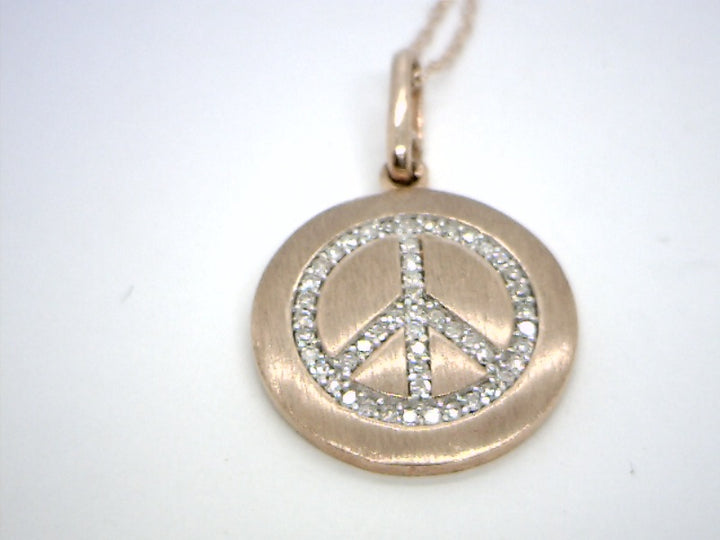 10K Yellow Gold Peace Diamond Pendant 0.15CTW.